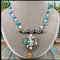 Adorned Crown artisan assemblage teal rhinestone cluster necklace