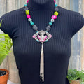 Adorned Crown Jewelry assemblage neon turquoise siren pendant tassel necklace