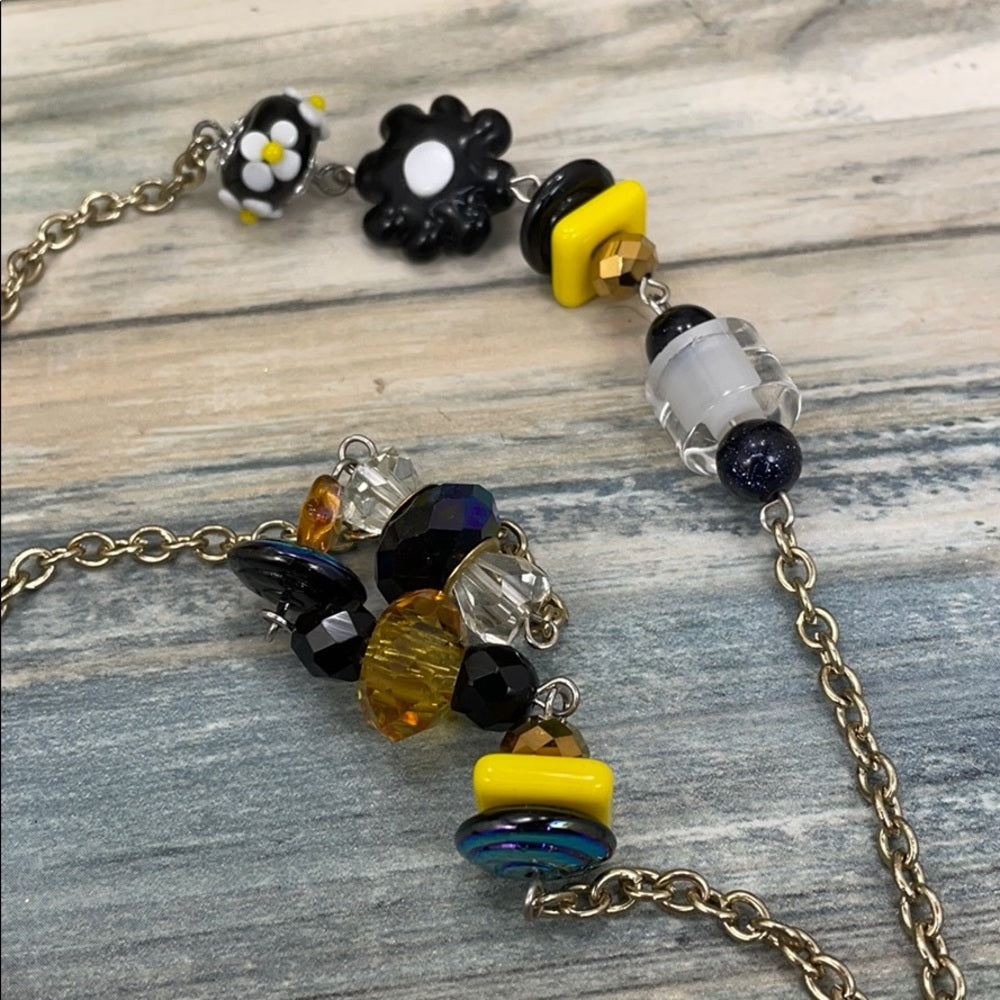 Adorned Crown assemblage black yellow bead lanyard keychain badge