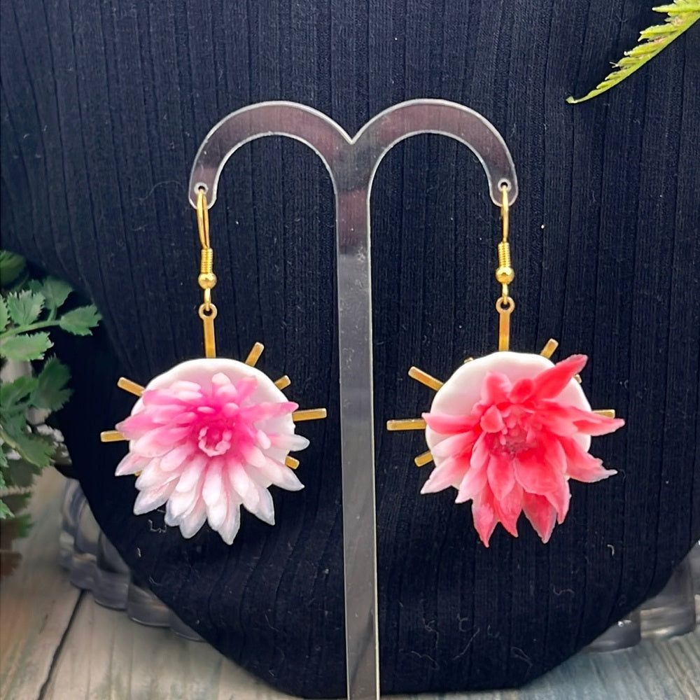 Adorned Crown Assemblage child’s play flower saucer starburst earrings