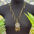 Adorned Crown Jewelry assemblage mixed metal cherub charm bugle necklace