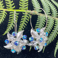 Adorned Crown assemblage AB rhinestone flower hoop earrings