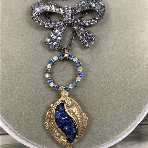 Adorned Crown artisan assemblage gold lapis rhinestone bow necklace