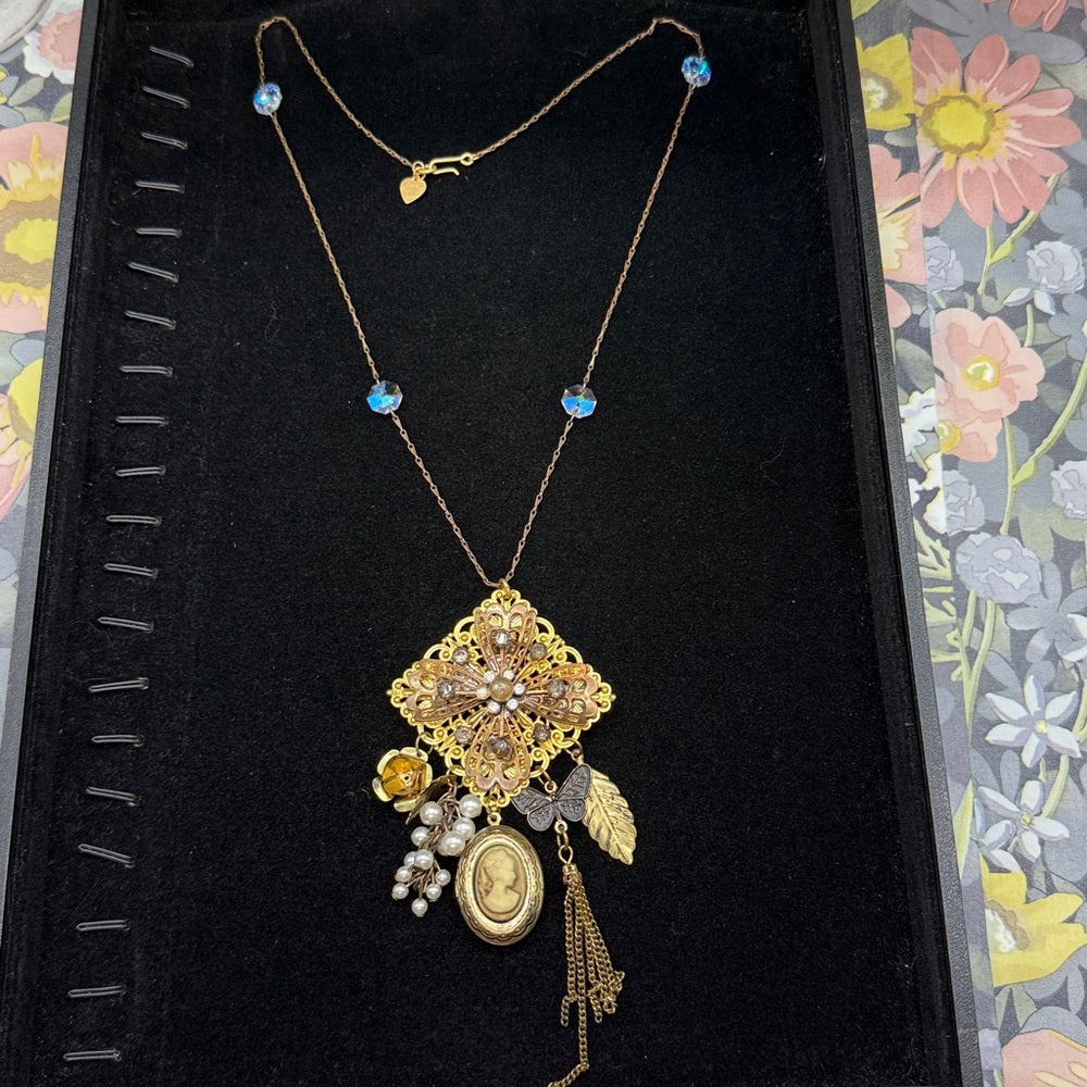Adorned Crown Jewelry assemblage filigree and charm crystal long necklace