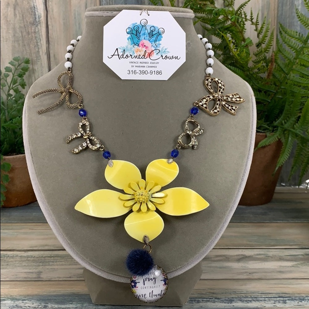 Adorned Crown artisan assemblage yellow enamel flower bow pray necklace