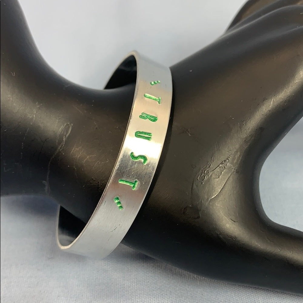 Adorned Crown Trust green stamp cuff bracelet