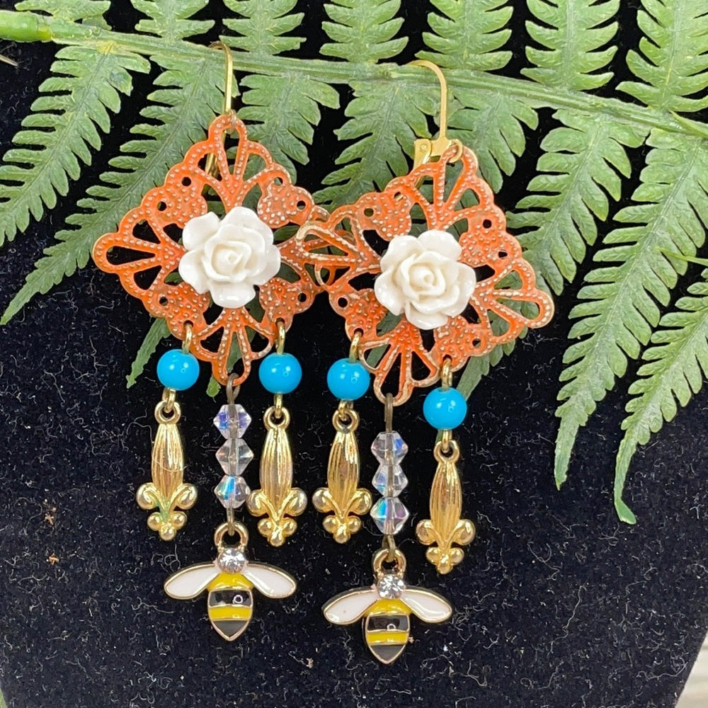 Adorned Crown assemblage buzzing bee earrings