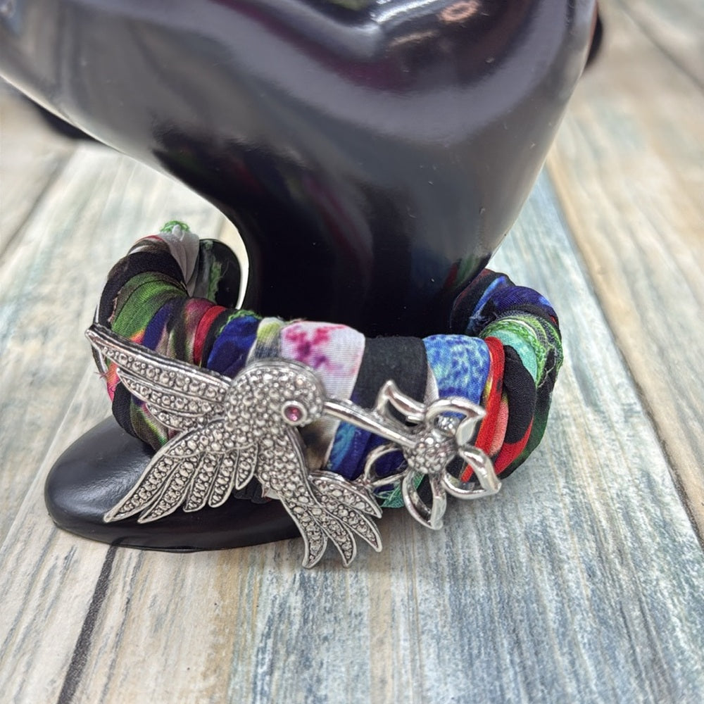 Adorned Crown Jewelry assemblage Hummingbird Multicolor Fabric cuff bracelet