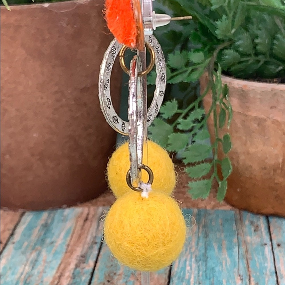 Adorned Crown artisan assemblage wool ball geometric textile earrings