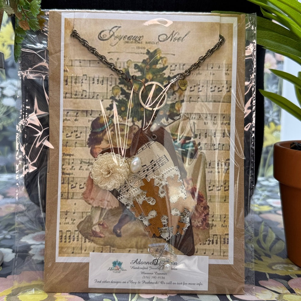 Adorned Crown Jewelry assemblage rusty heart sheet music snowflake necklace