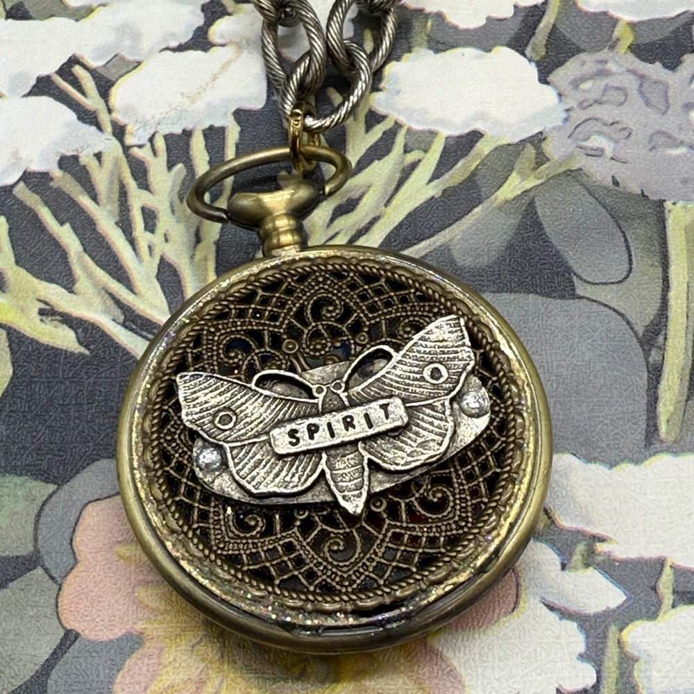 Adorned Crown Jewelry assemblage watch case spirit reversible pendant necklace