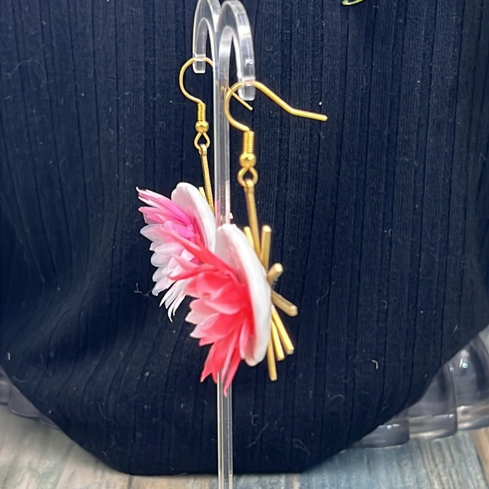 Adorned Crown Assemblage child’s play flower saucer starburst earrings