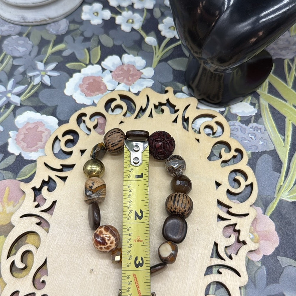 Adorned Crown Jewelry assemblage stretch beaded brown cross bracelet