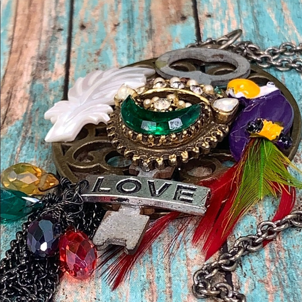 Adorned Crown artisan assemblage jungle toucan bird key cluster necklace