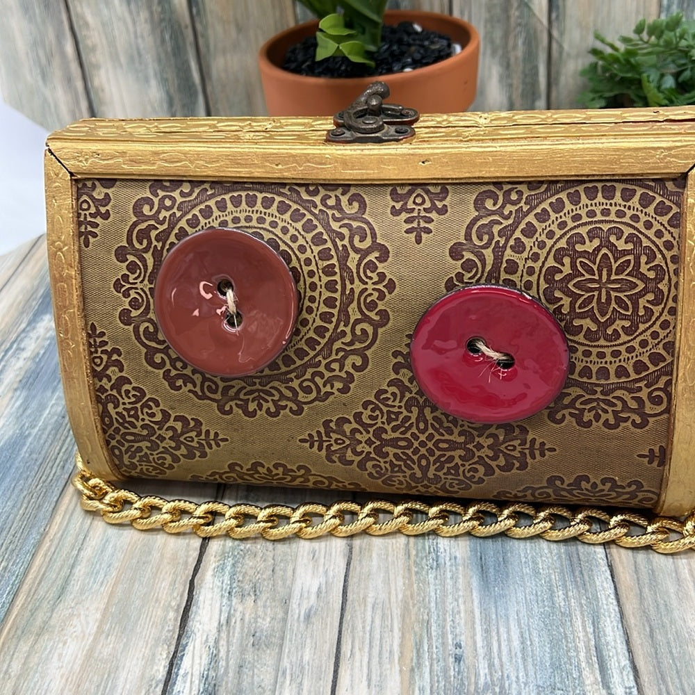 Adorned Crown Altered wood hinged big button gold handle green tassel purse