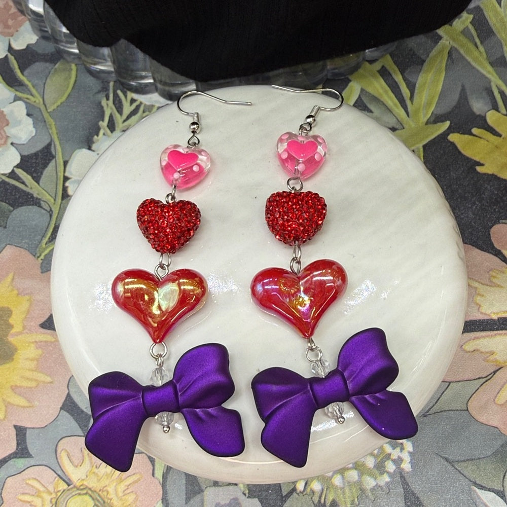 Adorned Crown Jewelry pink heart glitter red bows Valentine's Day earrings