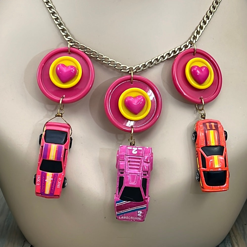 Adorned Crown artisan assemblage child’s play pink car necklace