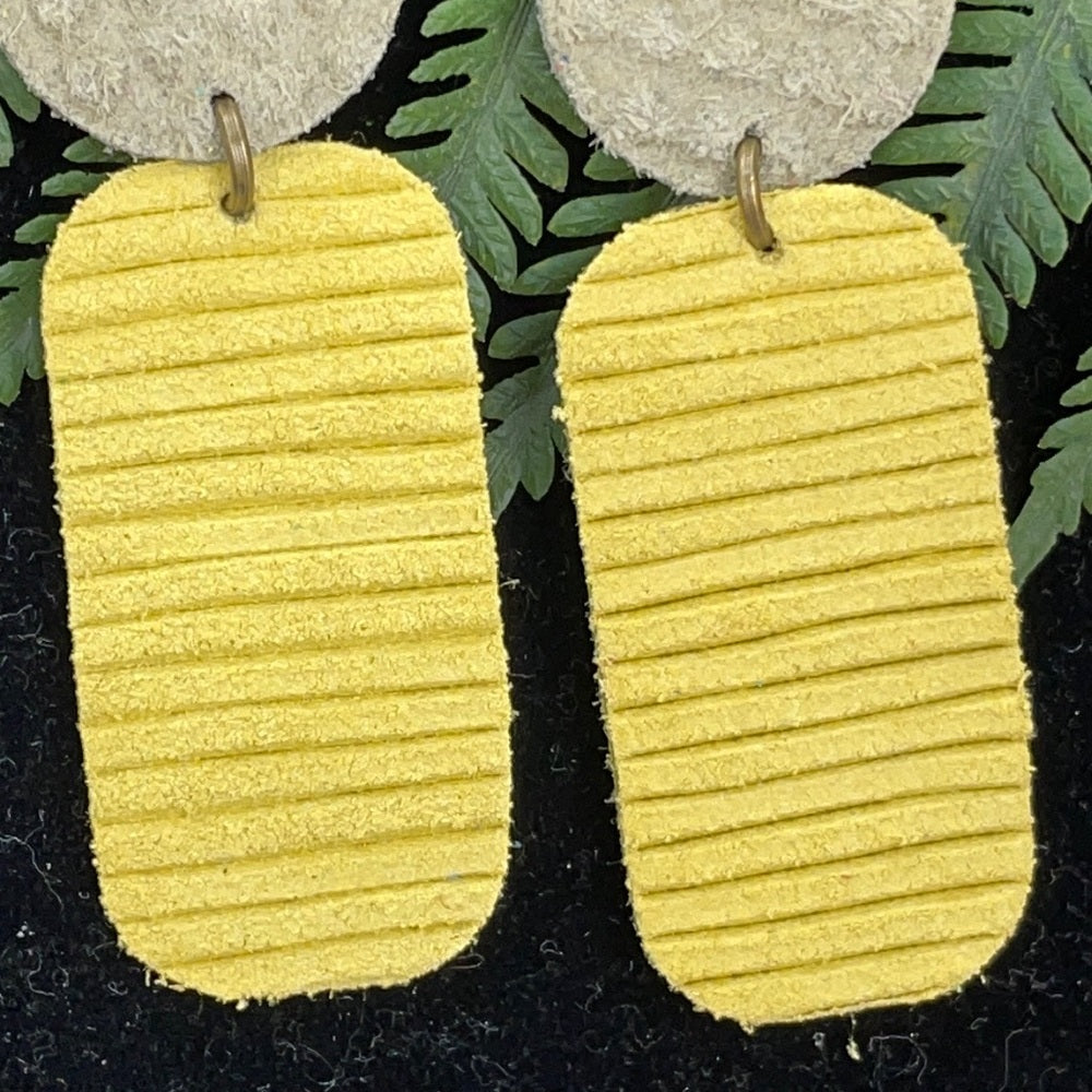 Adorned Crown geo yellow green double leather earrings