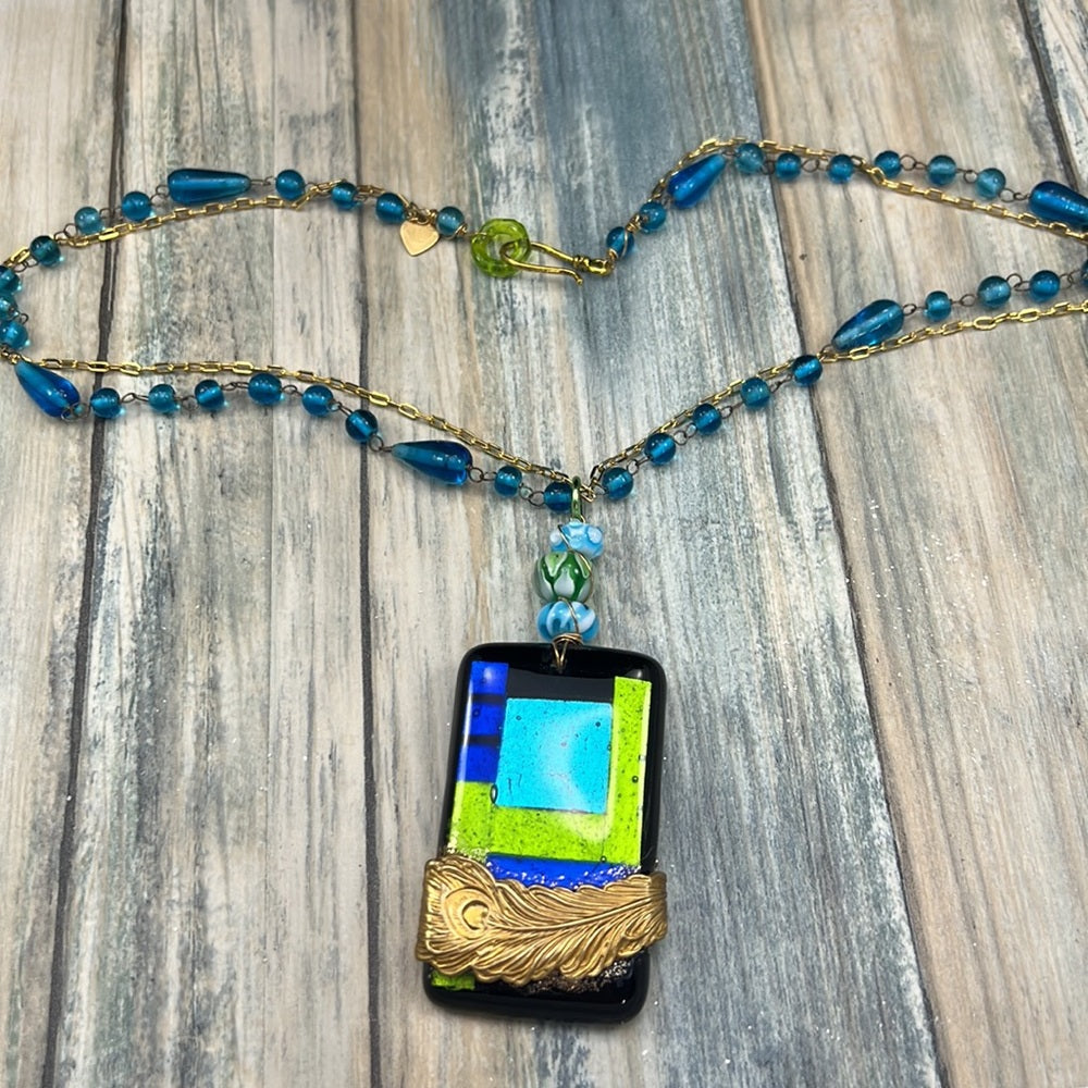 Adorned Crown Artisan Assemblage dichroic glass pendant feather necklace