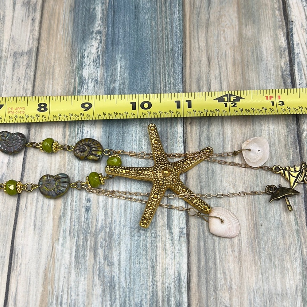 Adorned Crown Assemblage beaches & butterflies starfish fossil bead necklace