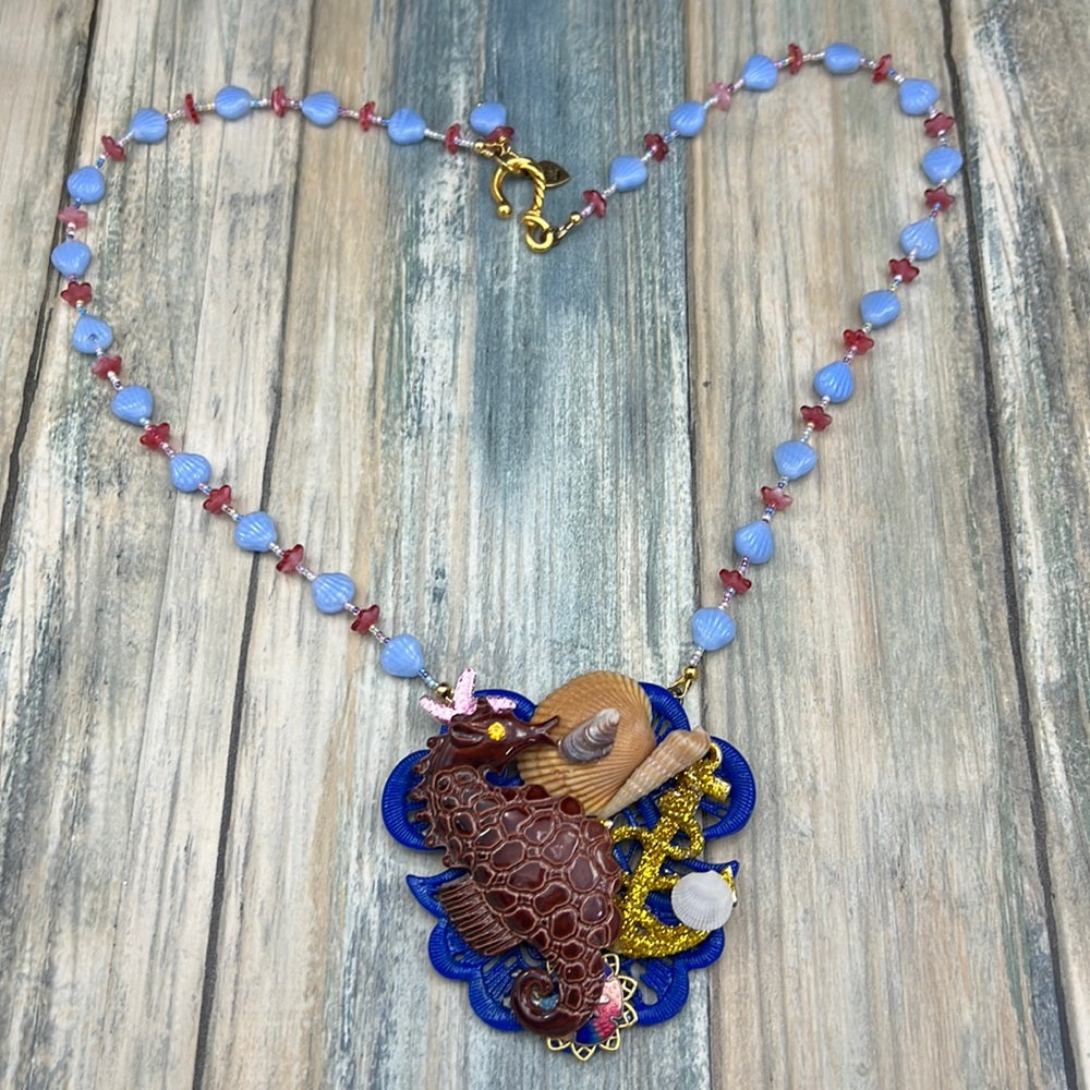 Adorned Crown Assemblage beaches & butterflies seahorse collage necklace