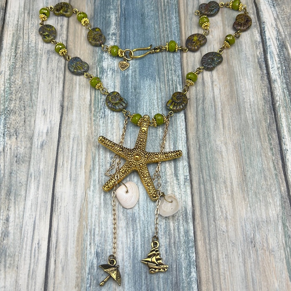 Adorned Crown Assemblage beaches & butterflies starfish fossil bead necklace