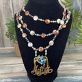 Adorned Crown Artisan Assemblage enamel flower beaded pearl mother necklace