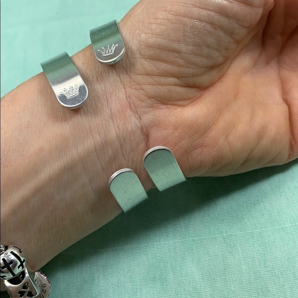 Adorned Crown Trust green stamp cuff bracelet