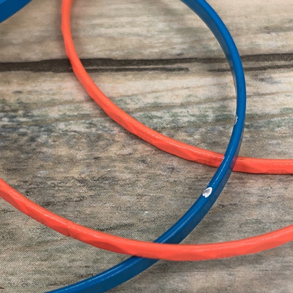 Adorned Crown assemblage blue orange bangles with charms