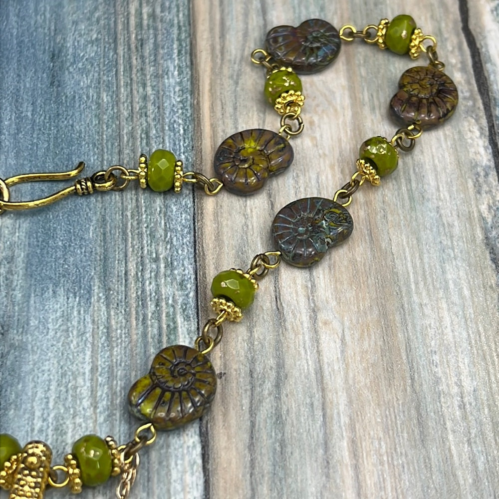 Adorned Crown Assemblage beaches & butterflies starfish fossil bead necklace