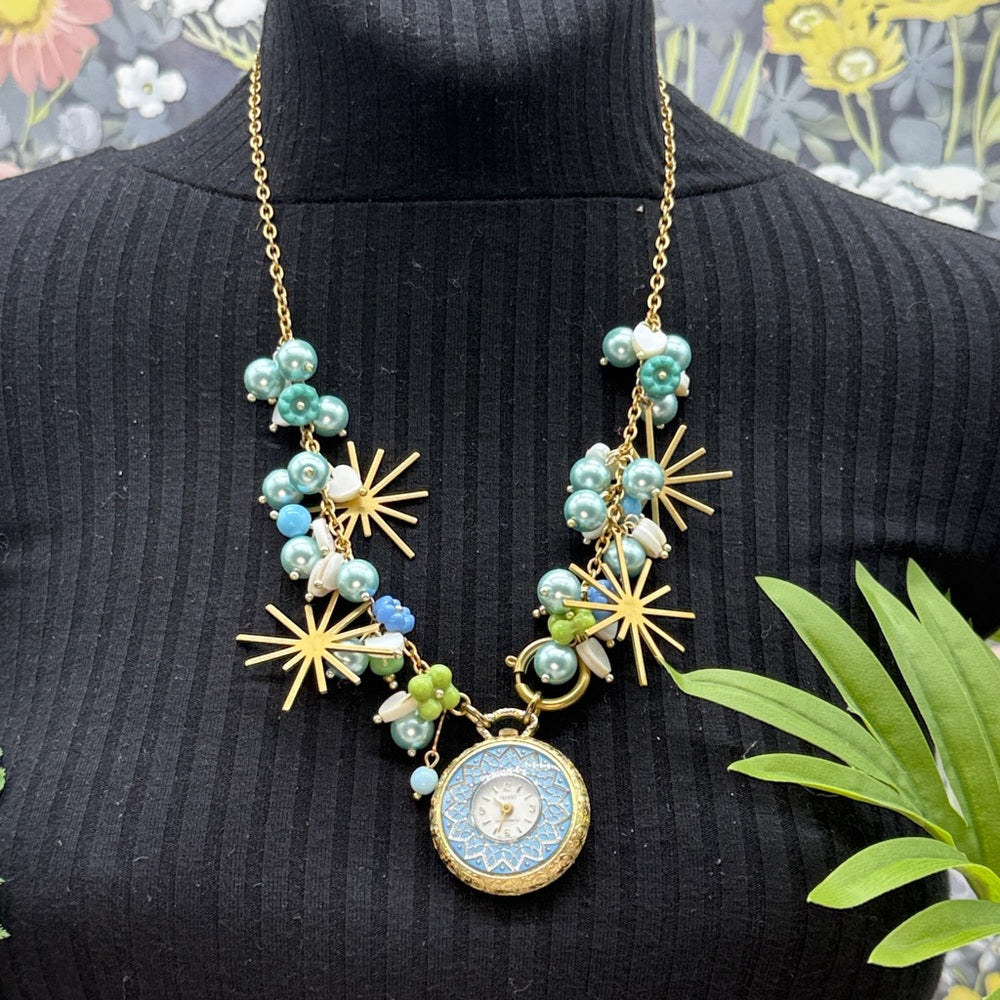 Adorned Crown Jewelry assemblage blue green watch starburst Czech necklace