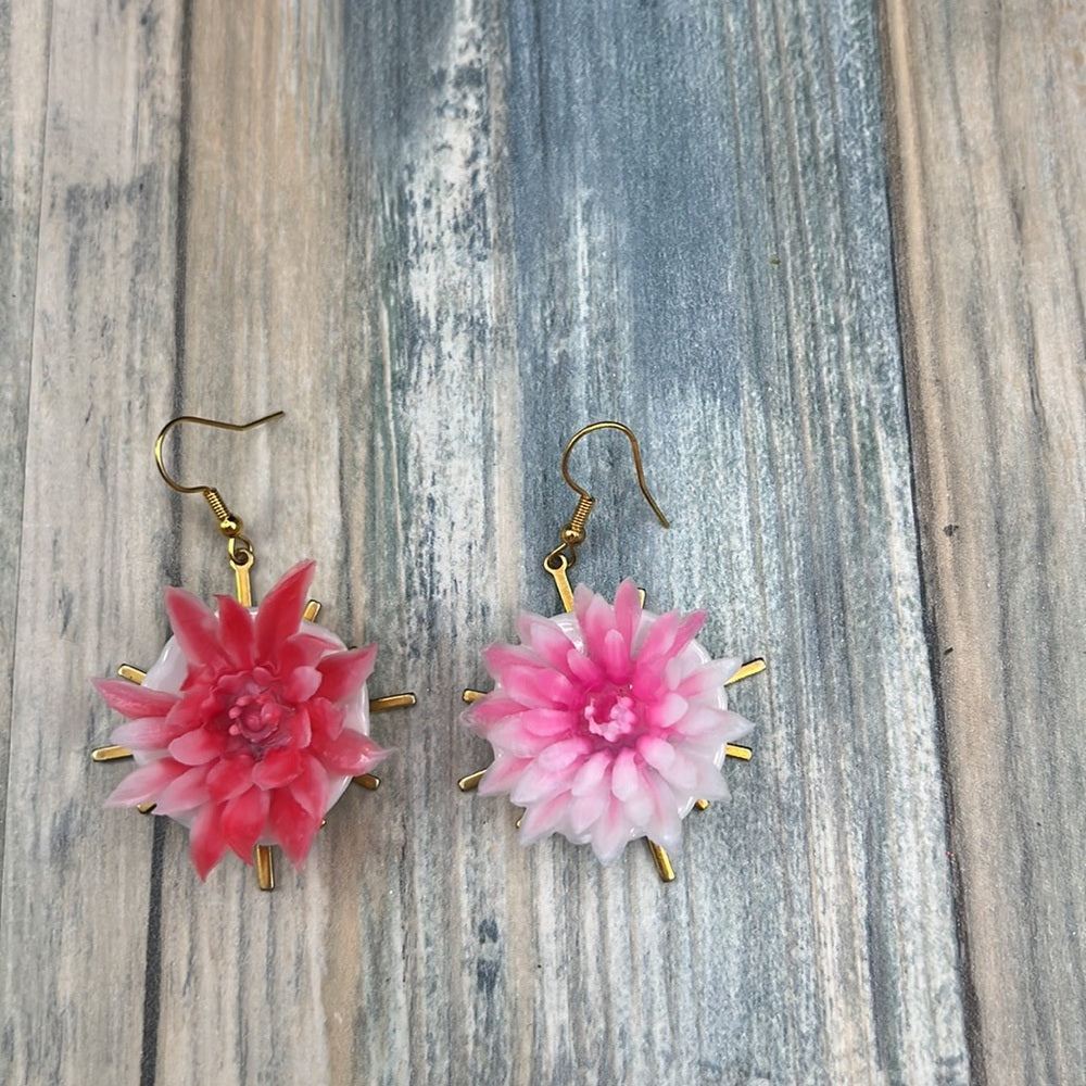 Adorned Crown Assemblage child’s play flower saucer starburst earrings