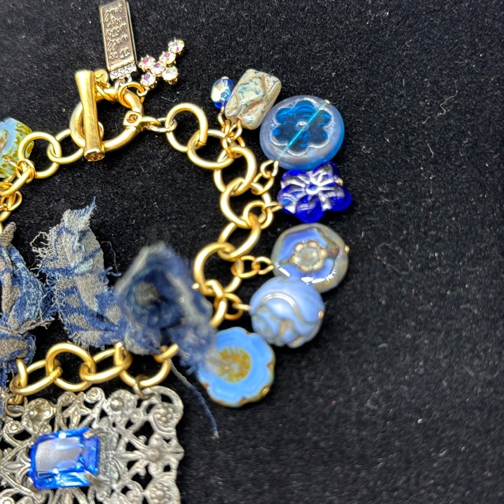 Adorned Crown Jewelry assemblage filigree shades of blue blue charm bracelet