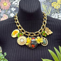 Adorned Crown Jewelry assemblage chunky charm yellow green flower necklace