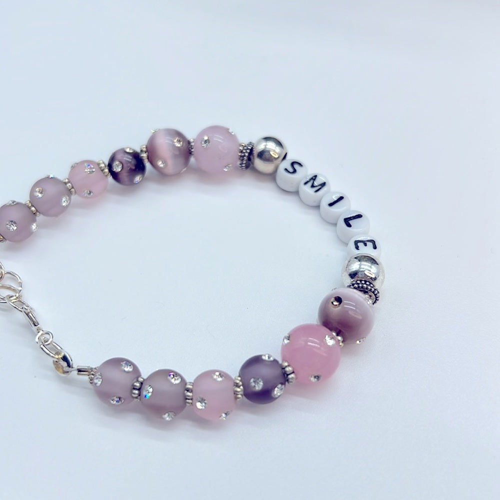 Adorned Crown Jewelry SMILE beaded sterling silver pink rhinestone bracelet