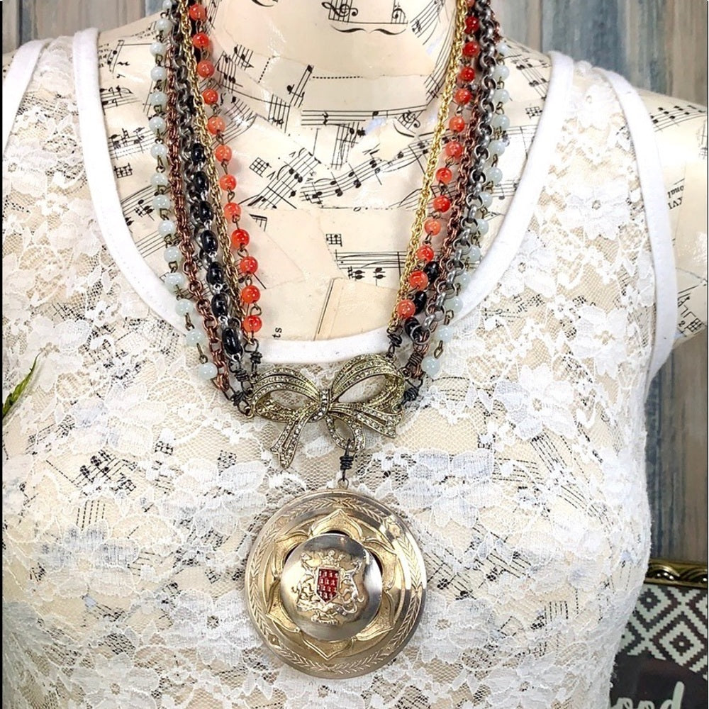 Adorned Crown Artisan assemblage shield medallion multi strand necklace