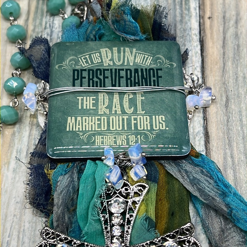 Adorned Crown Jewelry assemblage perseverance run race tassel cross necklace