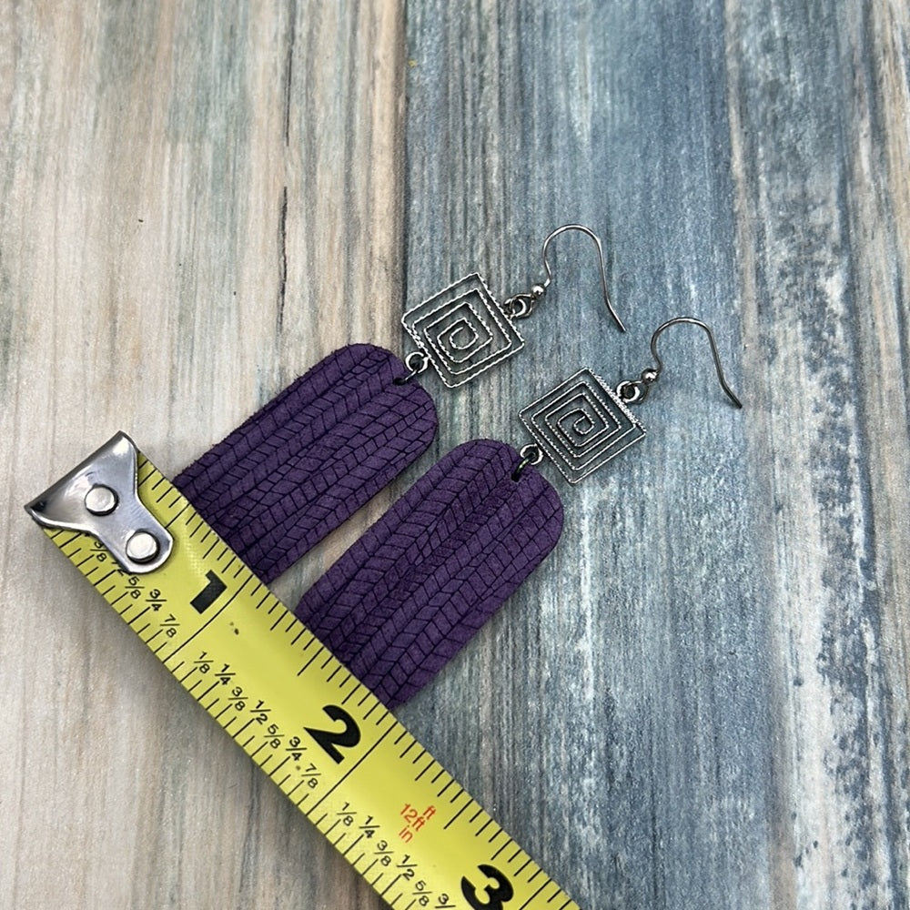 Adorned Crown Artisan purple genuine leather drop swirl earrings