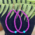 Adorned Crown assemblage pop of color purple hoop earrings