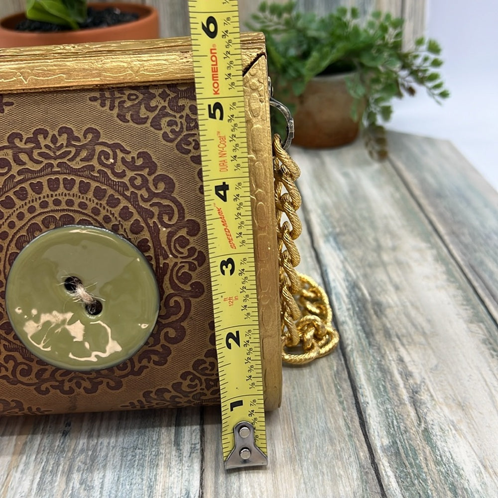Adorned Crown Altered wood hinged big button gold handle green tassel purse