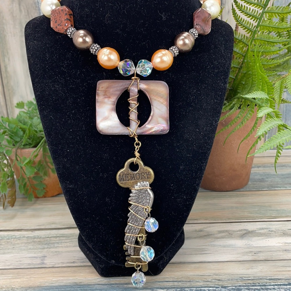 Adorned Crown Artisan assemblage shell buckle skeleton key necklace