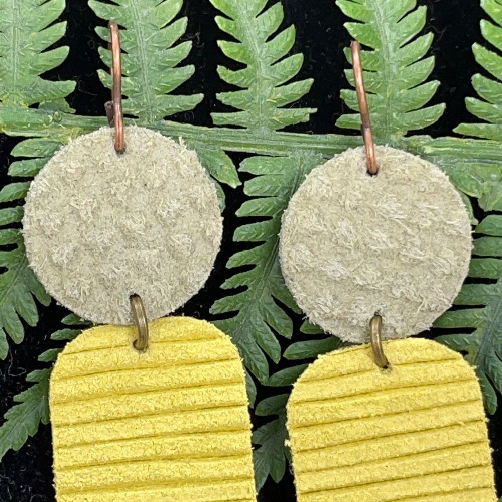 Adorned Crown geo yellow green double leather earrings
