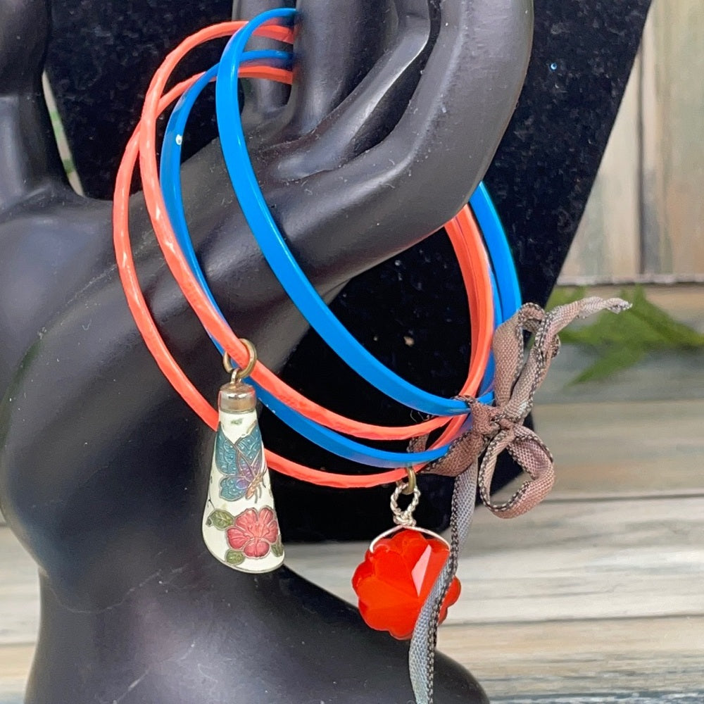 Adorned Crown assemblage blue orange bangles with charms
