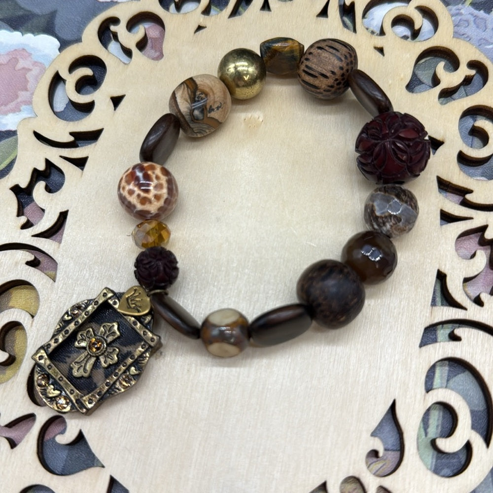 Adorned Crown Jewelry assemblage stretch beaded brown cross bracelet