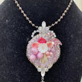 Adorned Crown assemblage pink cluster necklace