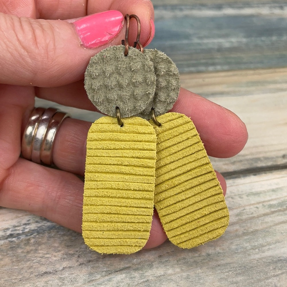Adorned Crown geo yellow green double leather earrings