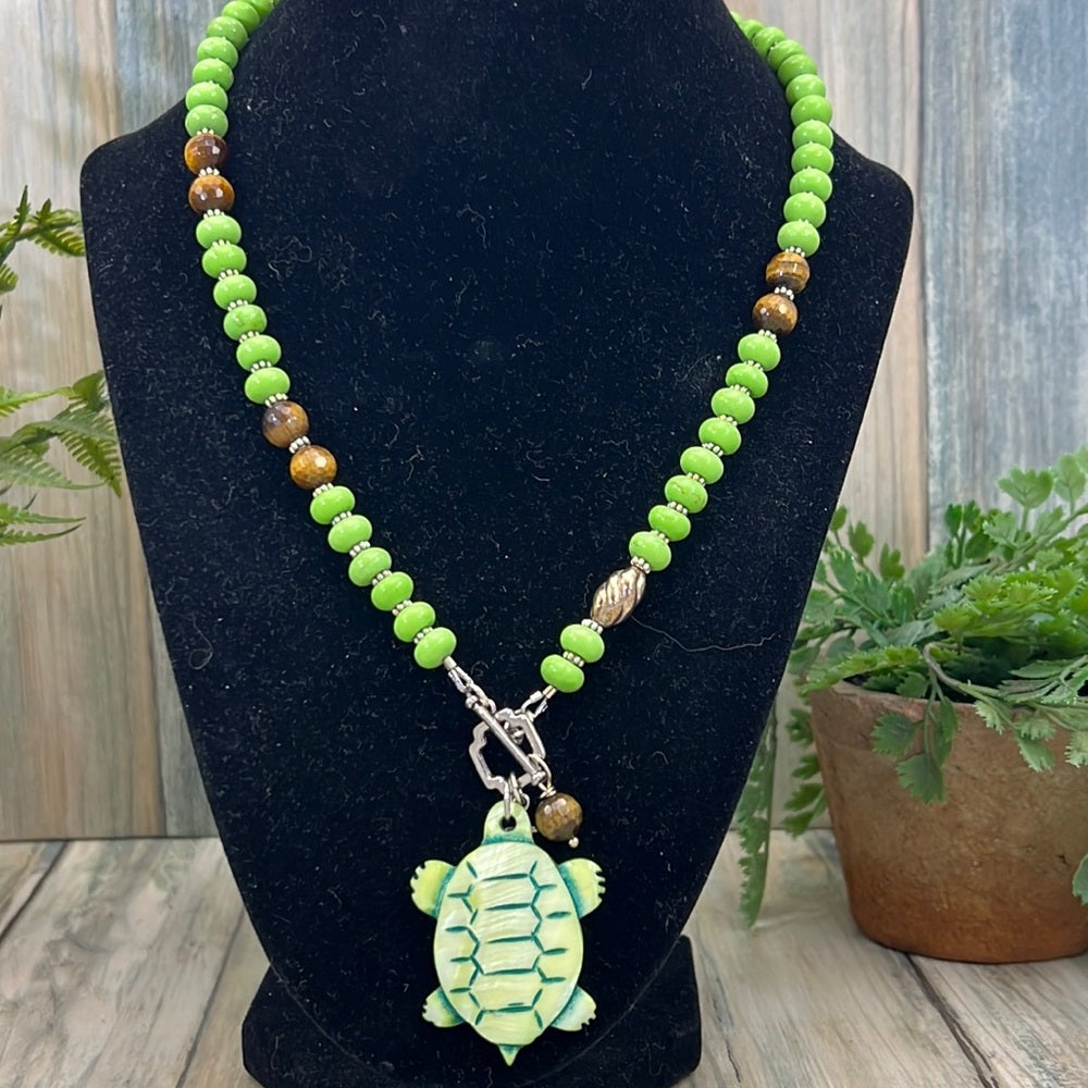 Adorned Crown Assemblage beaches & butterflies turtle anchor necklace