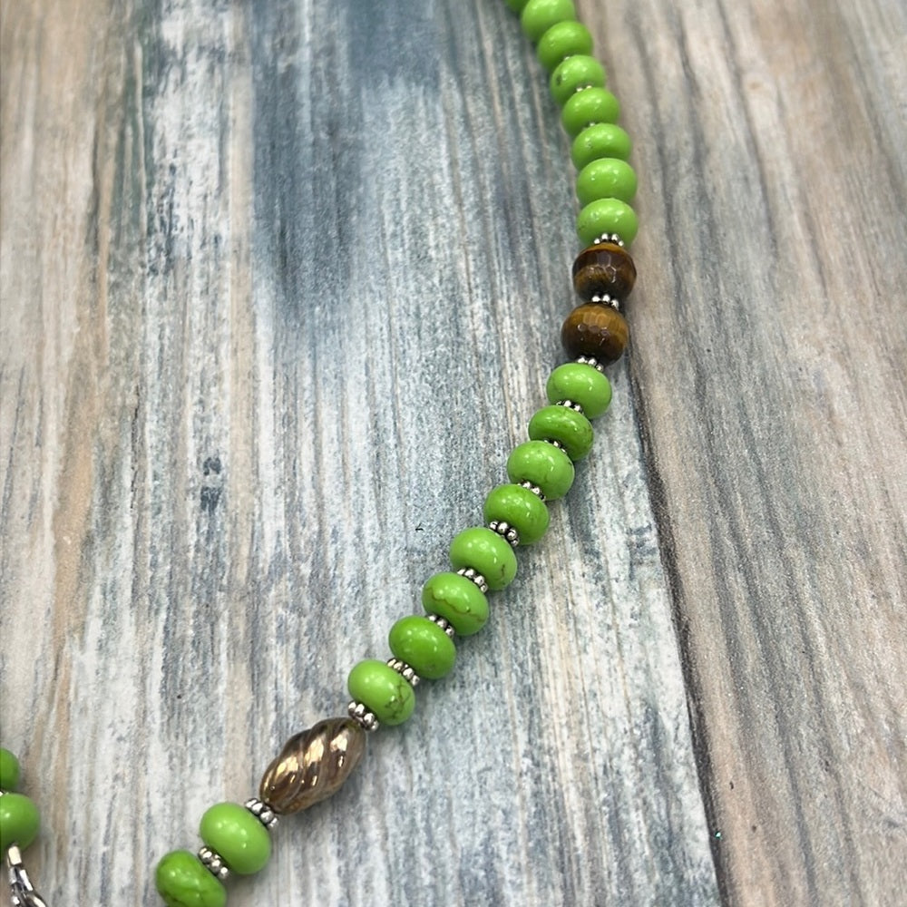 Adorned Crown Assemblage beaches & butterflies turtle anchor necklace
