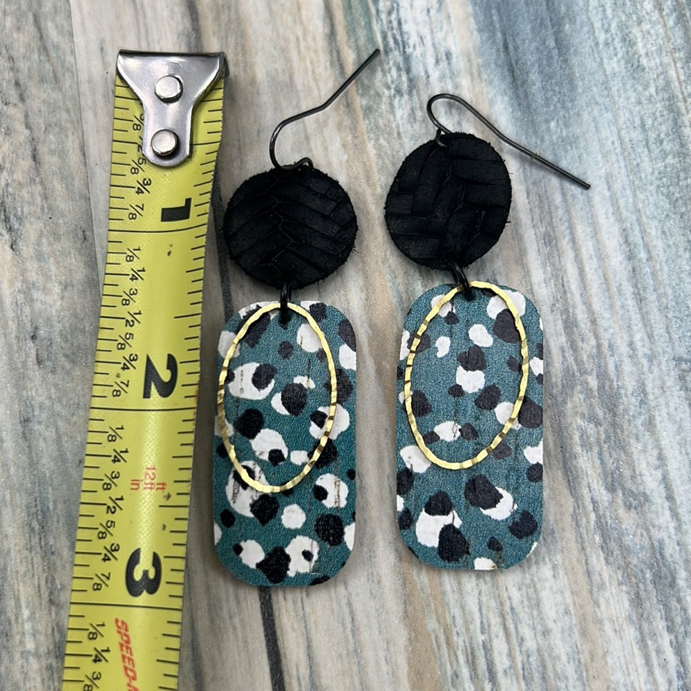 Adorned Crown Artisan Assemblage dotted leather faux leather oval earrings