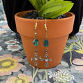 Adorned Crown Jewelry assemblage green crystal bead cross long earrings